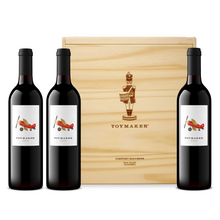 Load image into Gallery viewer, 2018 Toymaker | Napa Valley | Cabernet Sauvignon | Red Wine | Martha McClellan | Rated 97+ Points by Lisa Perrotti-Brown of The Wine Independent 750 ML wine bottle image with toy bi-plane airplane above the word Toymaker and the vintage 2018. 3-bottles in front of branded wood case with Toymaker Tin Soldier logo.